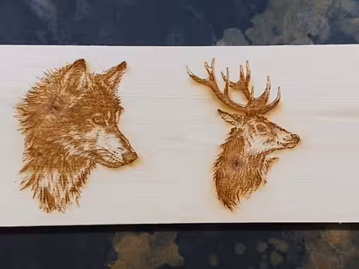 Tierköpfe gelasert in Arvenholz